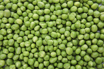 Texture of fresh green peas as background