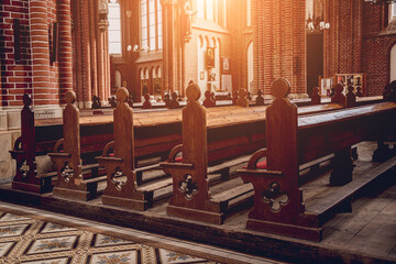 Rows of church benches at the old european catholic church.