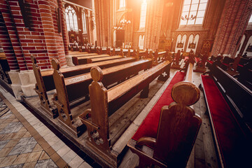 Rows of church benches at the old european catholic church.