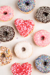 Glazed colored donuts.