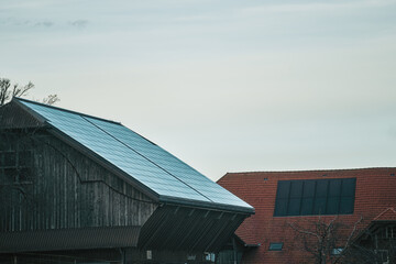 Efficient Solar Water Heating. Contemporary Pressure Collector on Rooftop. Solar water heating. Hot water from the sun.