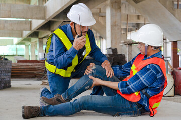 construction workers had an accident patient suffering misfortune physical knee injury from working...
