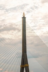 A vertical shot of a historic beautiful suspension bridge in Bangkok, Thailand