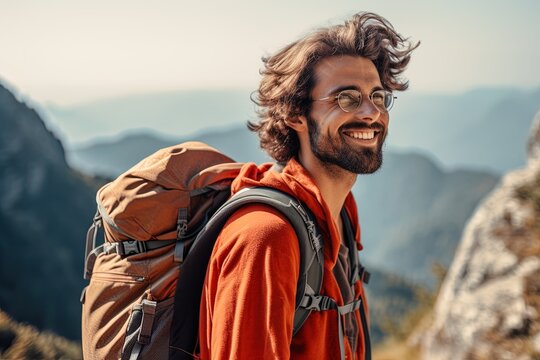 handsome young man with beard backpack trekking outdoors