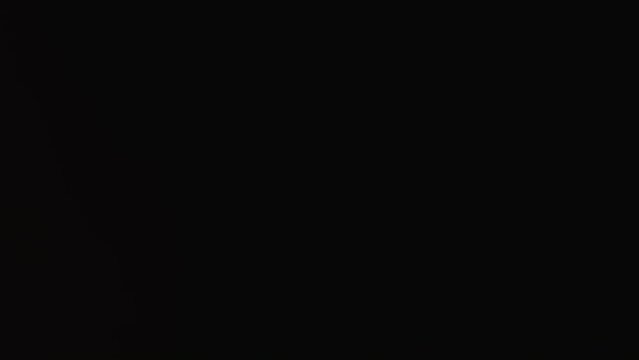 Transition effect for video editing. Video footage provides opportunity to experience beauty transition between light scenes creating effect intersection light. Warm orange color abstract blur flare