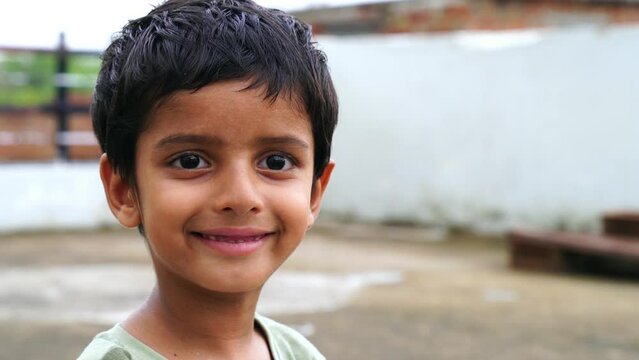 Portrait of a happy laughing child boy. Close-up portrait of him he nice-looking attractive lovely healthy glad cheerful cheery foxy ginger boy enjoying good mood.