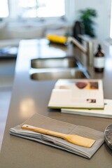 Closeup of kitchen utensils on a countertop in the kitchen