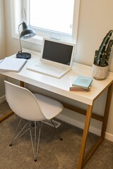 Modern home interior design with a laptop on a desk