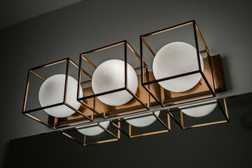 Low angle of modern chandelier design in a dark room