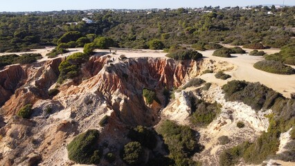 a daytime view of cliffs and hills