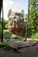 Fototapeta na wymiar Scenic view of a rock formation in a green park in Zittauer-Gebirge mountain, Germany