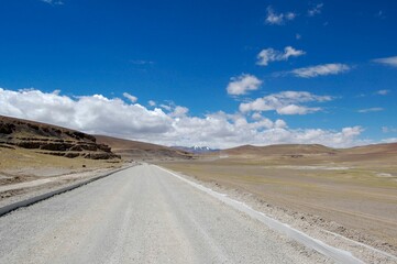 Fototapeta na wymiar Atacama desert savanna, mountains and volcano landscape on a sunny day