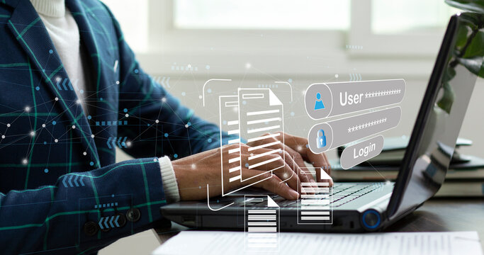 businessman working on laptop and pop up information to fill user and password while management document data in system, security data concept