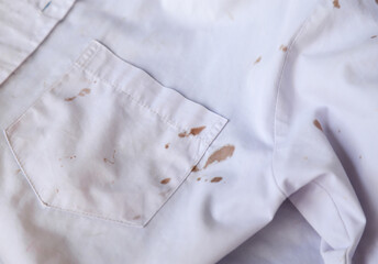 Dirty mud stain on cloth in playing moment. stain dirty in daily life for cleaning concept.