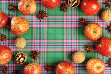 Bright ripe apples forming autumn mood background for design and decoration