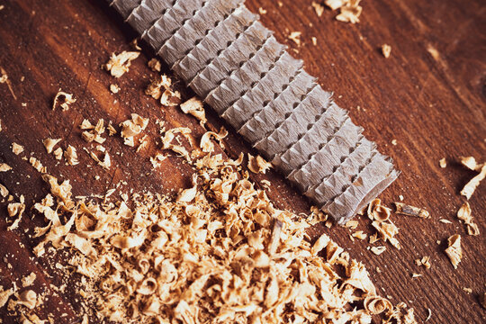 working tool rasp, drill shavings. wood processing concept