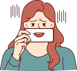Depressed woman with fake smile hides emotions pretending to be extrovert and happy human