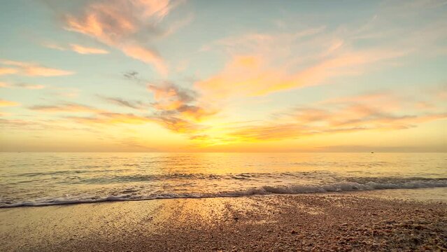 Beautiful beach and seascape during orange color sunset