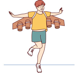 Little boy dreams of becoming pilot or astronaut and jumps in suit with airplane wings