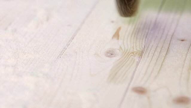 Treatment of a wooden surface with a wire brush on a screwdriver