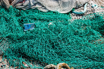 green and white trawl ropes and nets with drawn ropes and footrope 