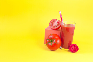 Tomato juice and red tomato close-up