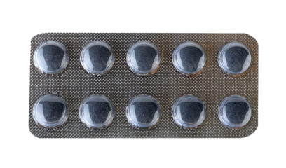 Activated charcoal (carbon) pills isolated on transparent png