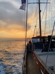 Beautiful Greek sunset from a sailing boat - 619078372