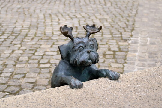 April 7 2023 - Brandenburg, Germany: wood pug sculpture in the city, in memory of Loriot