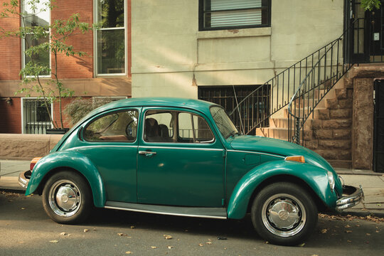 Green VW Beetle, in Cobble Hill, Brooklyn, New York