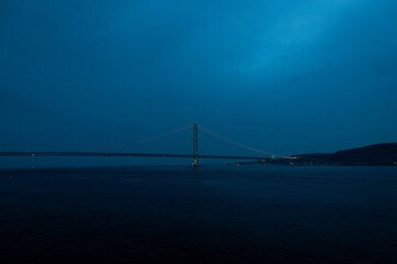 Night view of Akashi-Kaikyo bridge from ferry