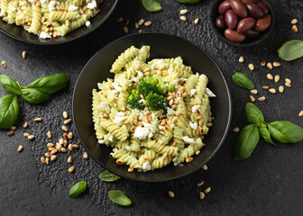 Creamy broccoli feta cheese pasta with pine nuts. Healthy food