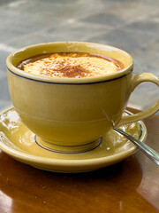 Traditional Egg Coffee on Street of Hanoi Old Quarters Vietnam. The coffee flavours and texture is so delicious a must coffee to try when your in Vietnam 