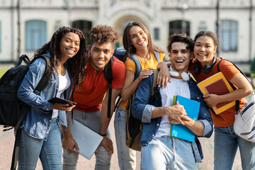 College Friendship Concept. Happy Multiethnic Group Of Students Posing Outdoors