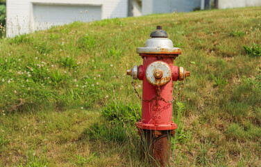 Fototapeta na wymiar fire hydrant stands prominently on the street, representing safety, emergency preparedness, and a lifeline in times of crisis
