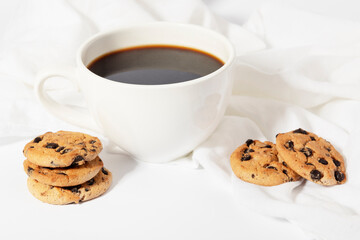 Coffee cup on white cloth
