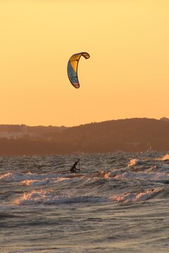 kite surfing at sunset