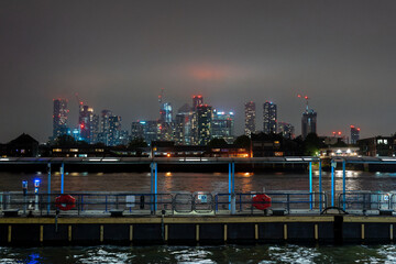 Fototapeta na wymiar London Skyline skyscrapers at night behind the River Thames, view from Greenwich 