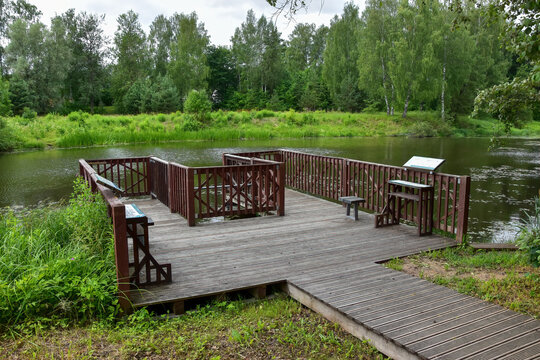 Nature paek in the city with flowers and wooden boardwalks