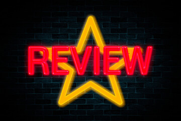 Review with star symbol the neon banner on the brick wall background.