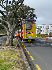 Highway maintenance and traffic safety vehicle with traffic cones and signs - road works concept....
