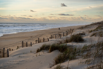 Large Sand Dunes Next to Large Beach During the Winter