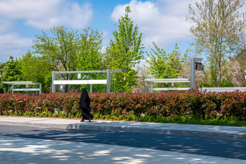 Abaya Women walking in Garden. No Face