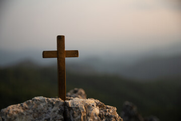 Crucifixion Of Jesus Christ - Cross At Sunset. Silhouette cross on Calvary mountain sunset...