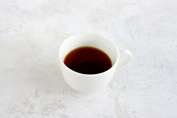 cup of chicory tea isolated on gray background, close up 
