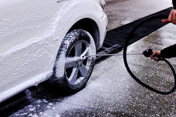 white car on car wash