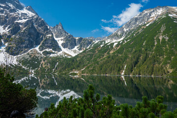 Naklejka na ściany i meble beautiful landscape view of Lake Morskie Oko in the mountains with clear water and reflection in Zakopane Poland in the Tatra National Park