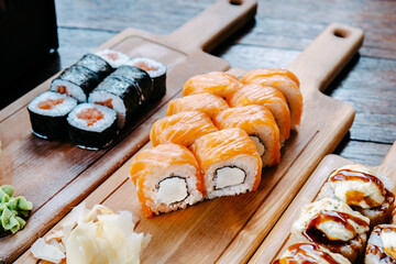 Sushi on a wooden table in a restaurant.