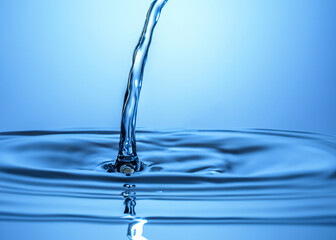 Fluid Serenity: Calming Blue Tones of Flowing Water in a Peaceful and Refreshing Image