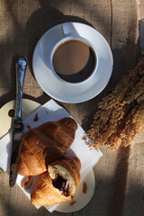 cup of coffee and croissant